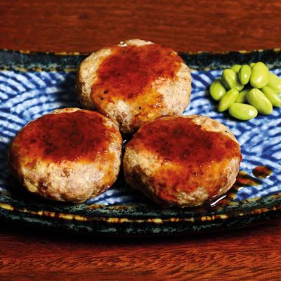 Three small homemade patties made of beef, pork, soy pulp (okara) and tofu with homemade Japanese sauce (each additional piece +2,60€)