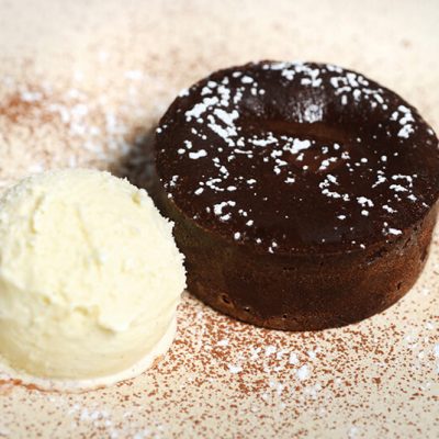 Black chocolate foundant with Yuzu (Japanese lime) flavour and served with vanilla icecream